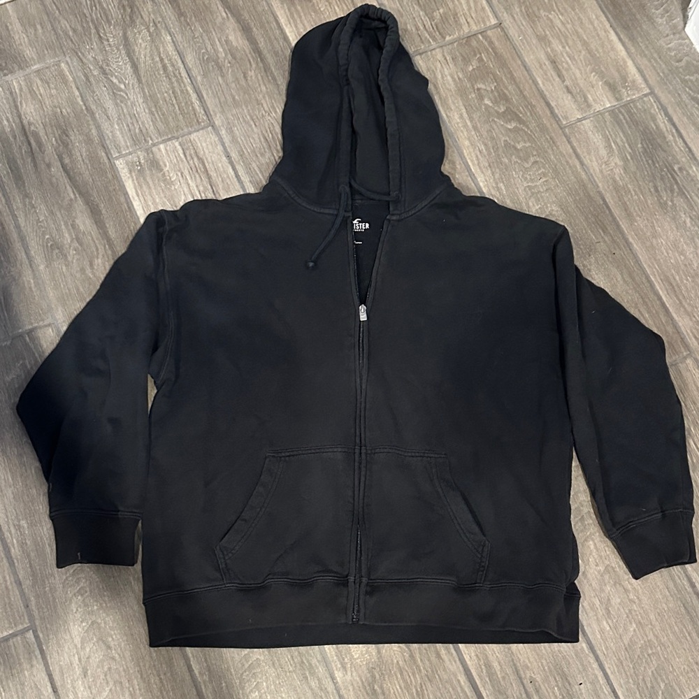 Hollister Black Zip-Up Hoodie, Size Large. Fleece, with true tie hood. Zip up